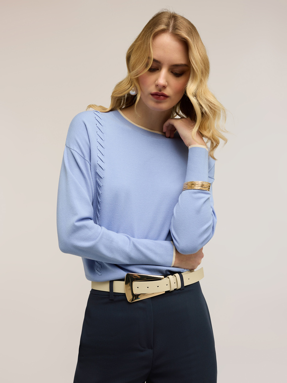 Maglia con impunture decorative