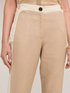 Pantaloni con piping e spacco sul fondo image number 2