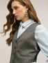 Gilet fantasia gessata con paillettes image number 3